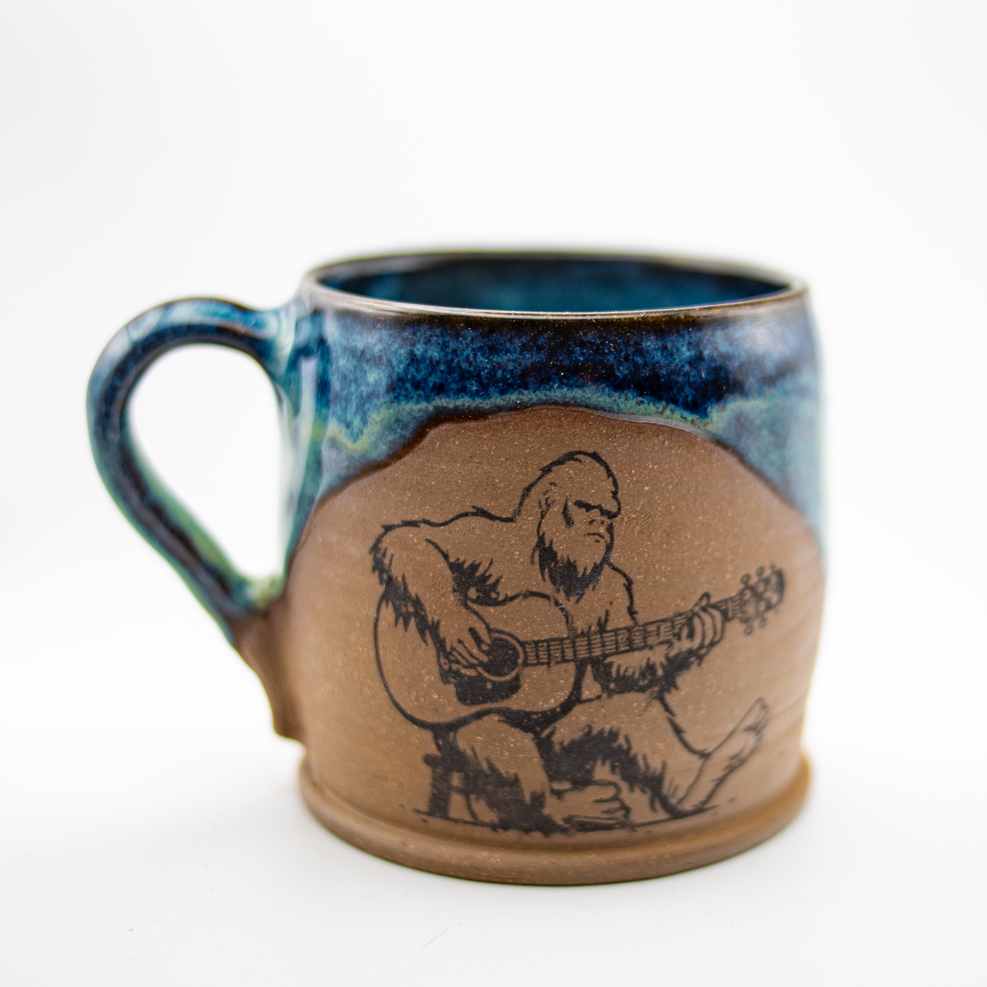 Bigfoot Playing Guitar Mug