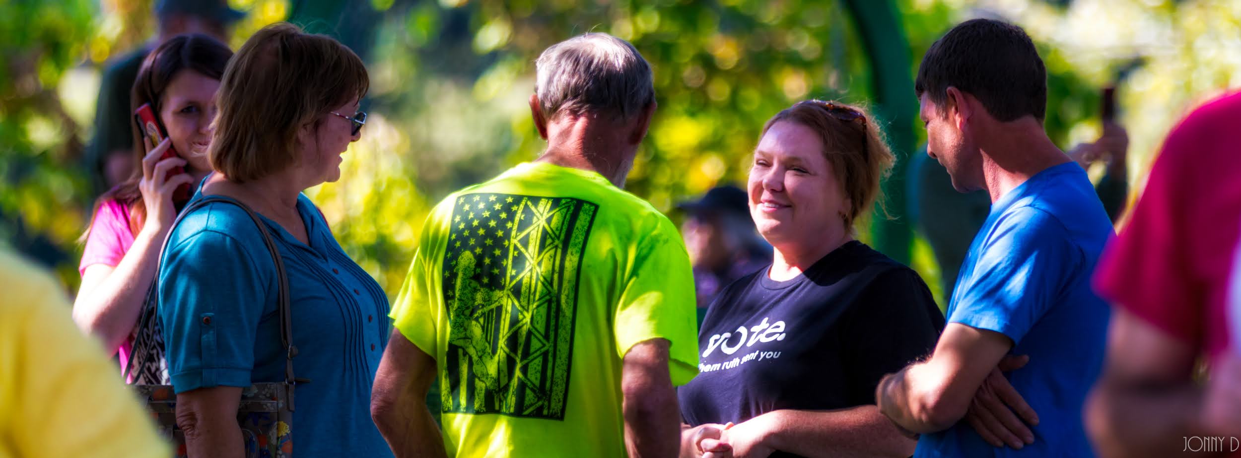 Amy talking with people at the No Kings gathering in Marietta.